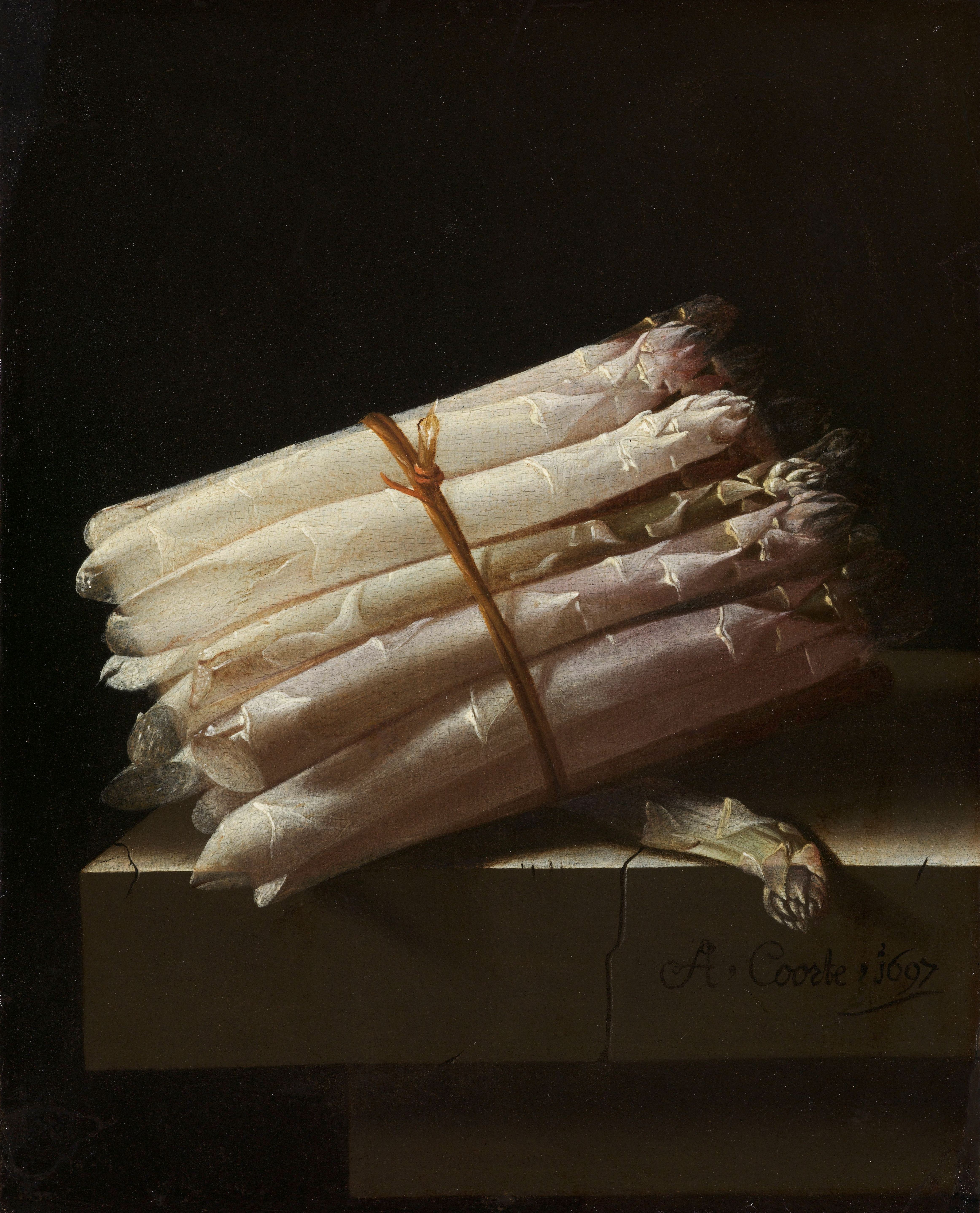 still life, asparagus shoot lying on a table, dark background